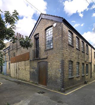 The project occupies an existing two storey Victorian workshop and a more recent former commercial premises