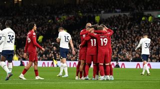Liverpool players celebrate Mohamed Salah's first goal against Tottenham.
