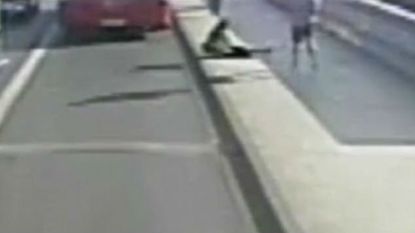 Angry jogger pushes woman CCTV
