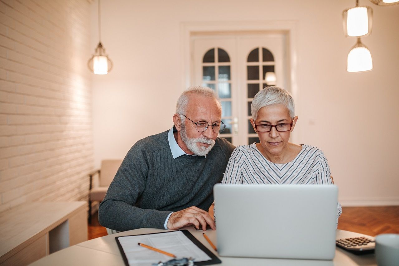 Senior couple browsing the internet together