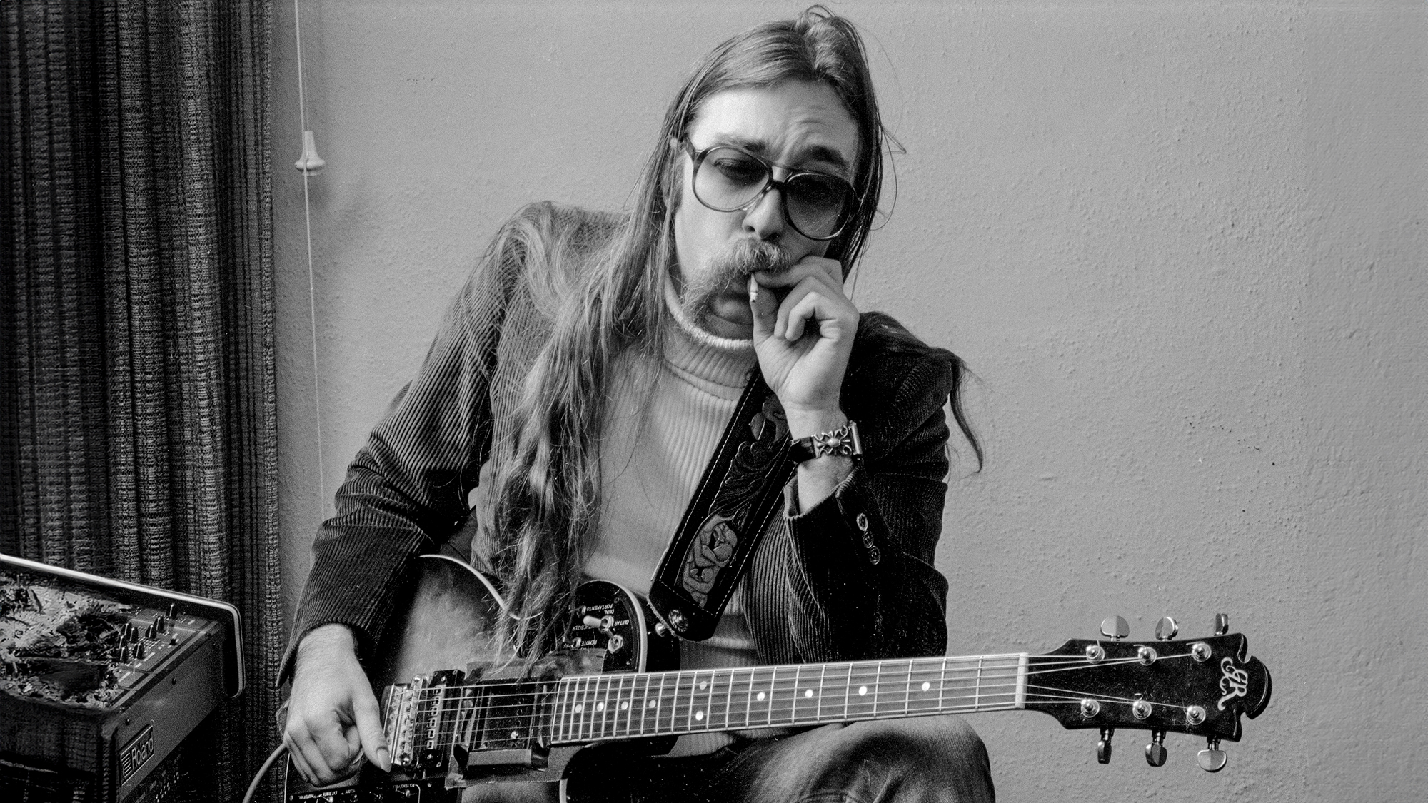 Jeff "Skunk" Baxter smokes a joint as he poses for a photo in the late 1970s