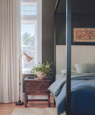 Blue gray bedroom with four poster