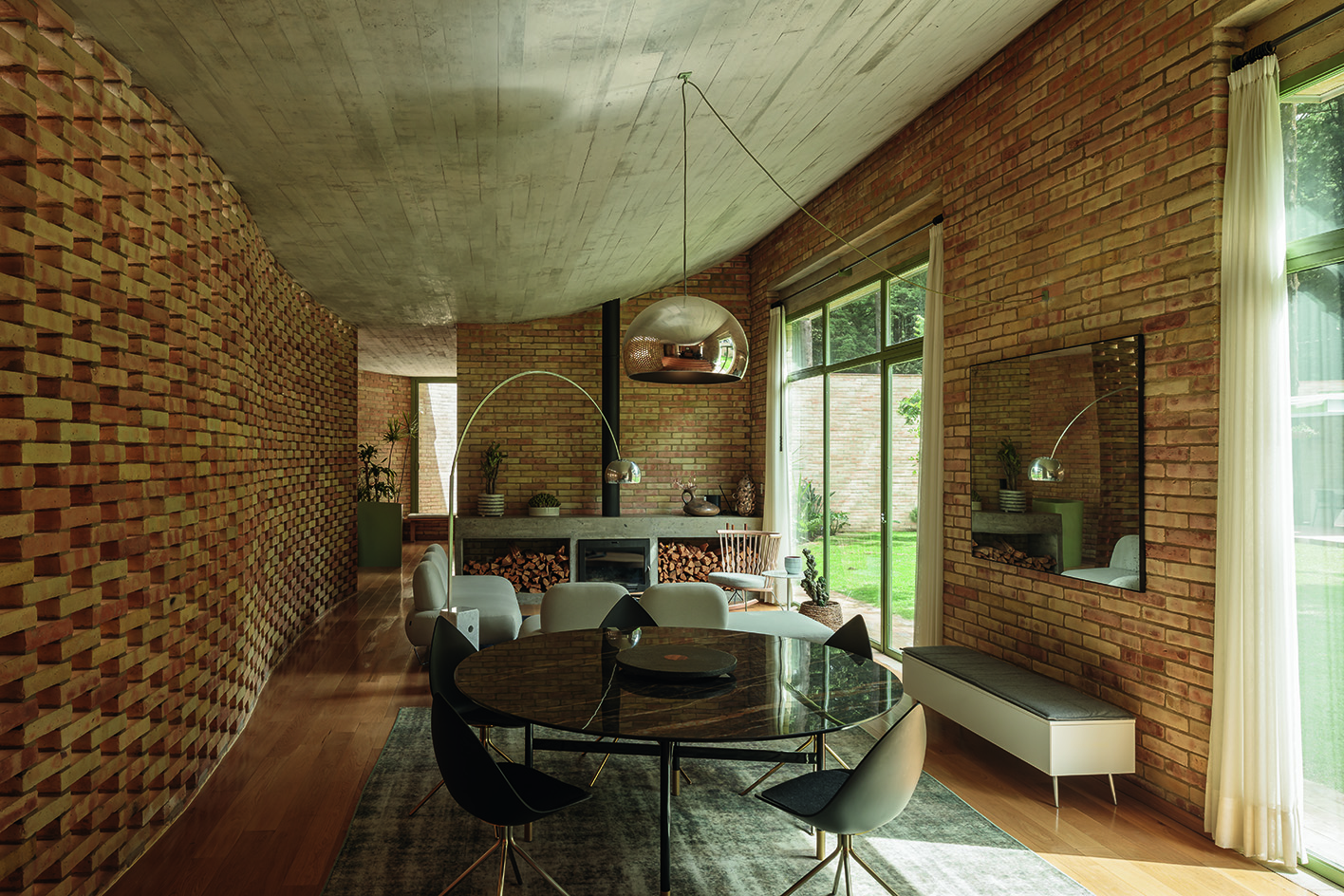interior view of naked brick walls in living space at Mexican retreat casa jajalpa by lanza
