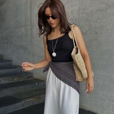 woman in tank and maxi skirt