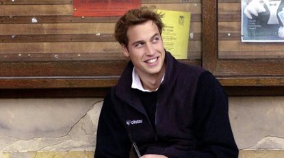 Prince William sits on a stone bench in St Salvator&#039;s Quad at St Andrews University where he is a student. 