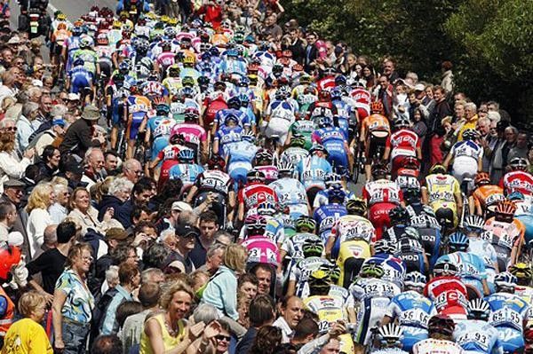 Fans cheer on the peloton