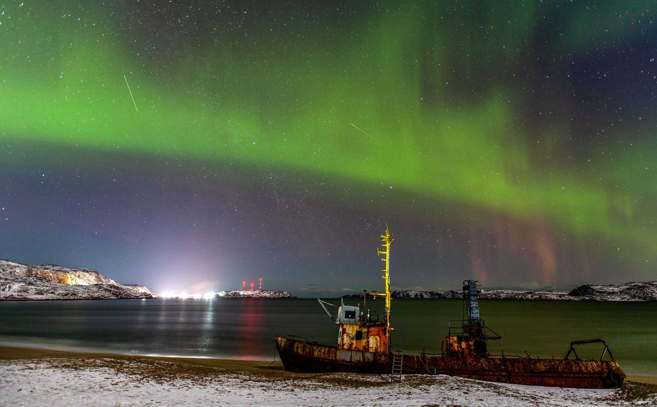 The northern lights are seen over Teriberka, Russia, a village with the population of about 1,000 people, located some 120 km away from the city of Murmansk on the Russian Arctic coast on Oct. 30, 2021.