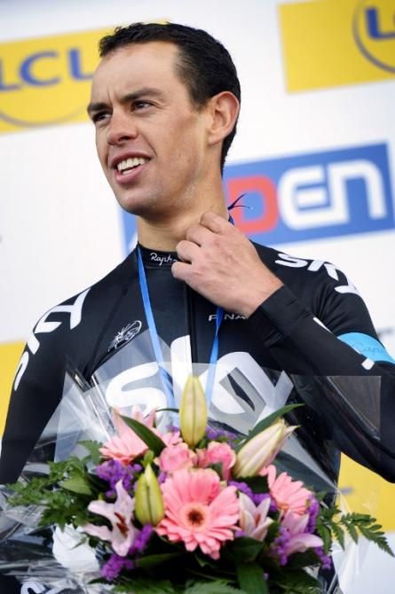Richie Porte (Sky) with the winner's bouquet