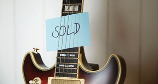 Guitar with sold sticker