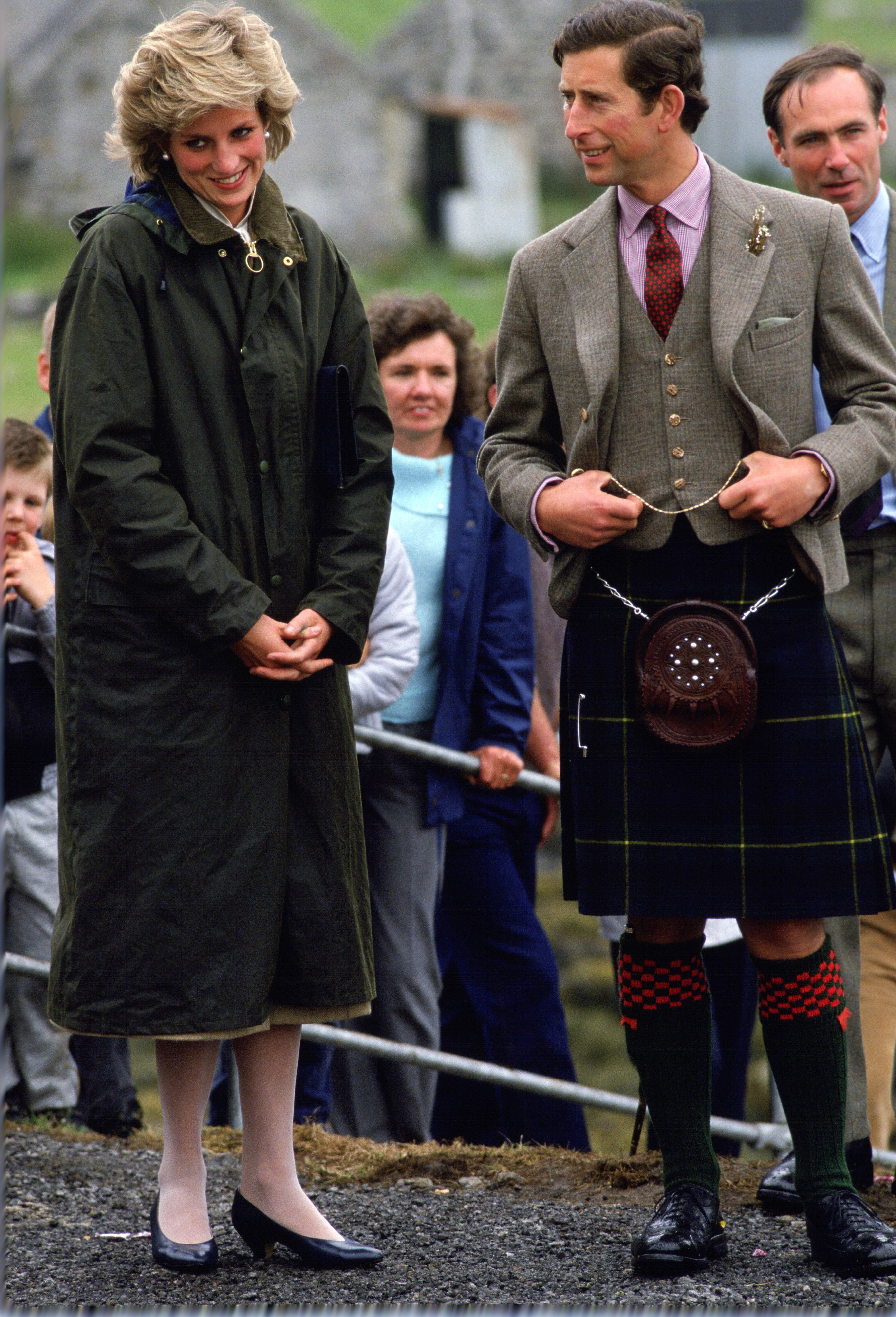 An image of Princess Diana wearing a country jacket to Glastonbury in 1985.