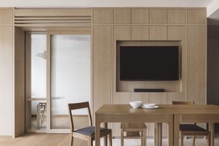 minimalist dining room with pocket doors