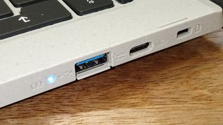 Acer Chromebook Vero 514 review; a close up of a laptop's ports, a blue light is glowing