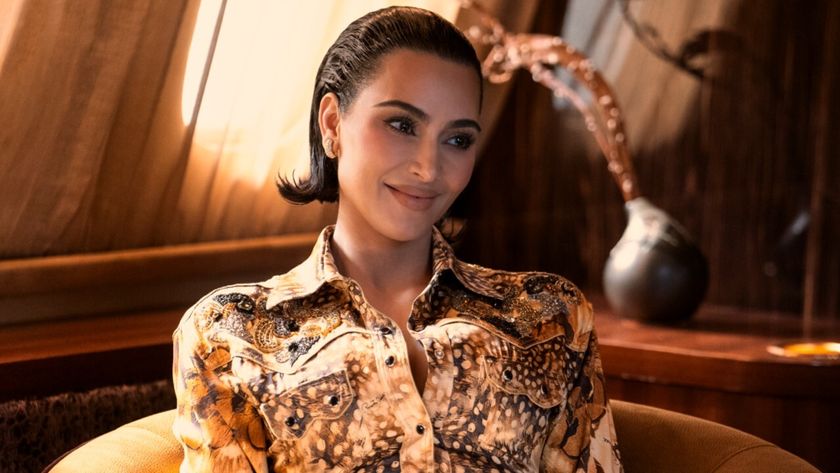 Kim Kardashian smiling in All&#039;s Fair.