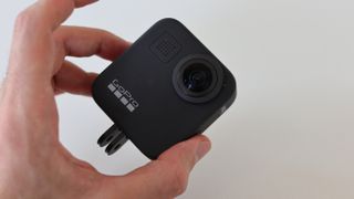 GoPro Max and GoPro Hero 8 both have a built-in foldaway mount in the baseplate