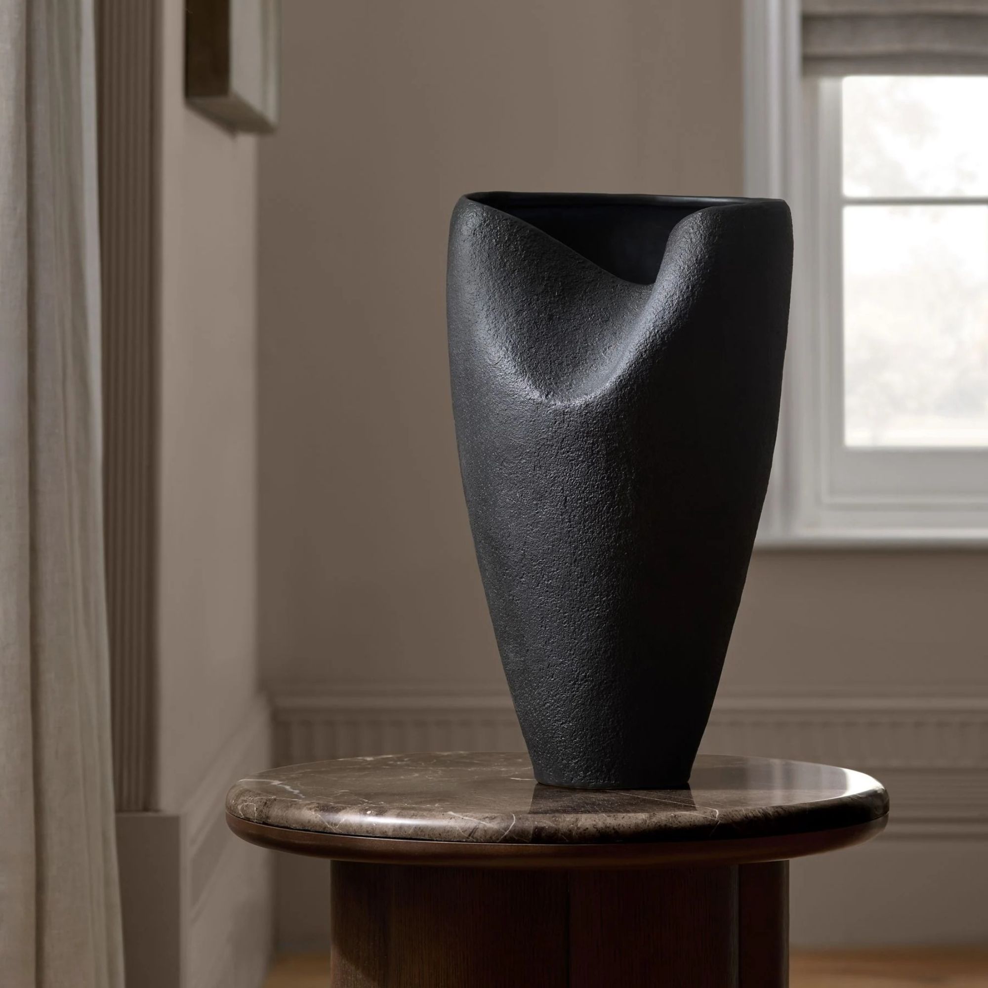 black sculptural vase