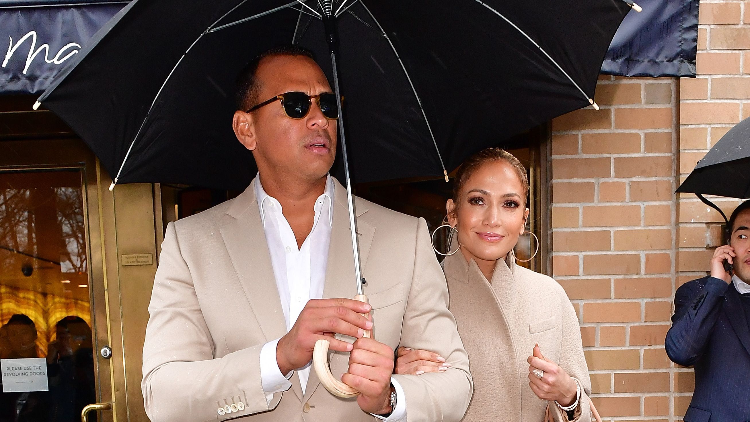 White, Umbrella, Fashion, Suit, Street fashion, Eyewear, Fashion accessory, Outerwear, Blazer, Event,