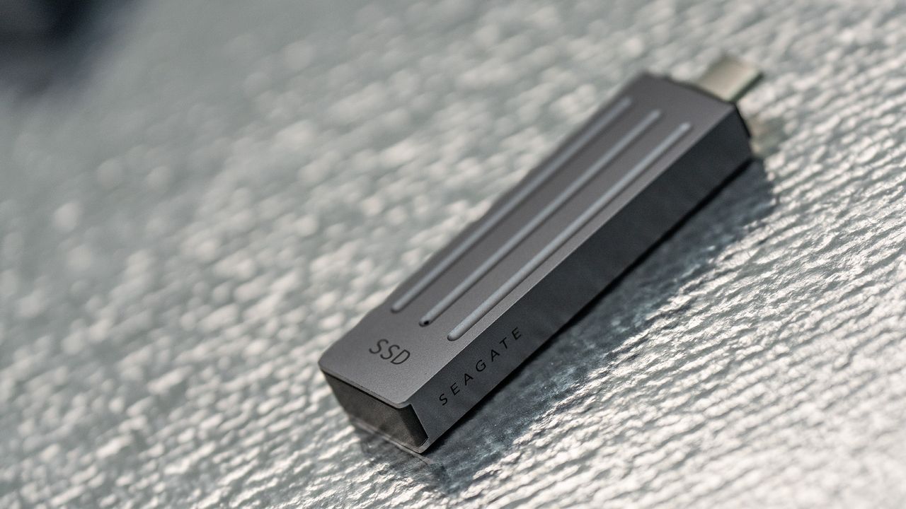 Seagate Ultra Compact SSD on a glass background.