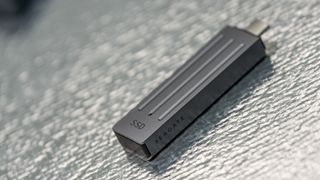 Seagate Ultra Compact SSD on a glass background.