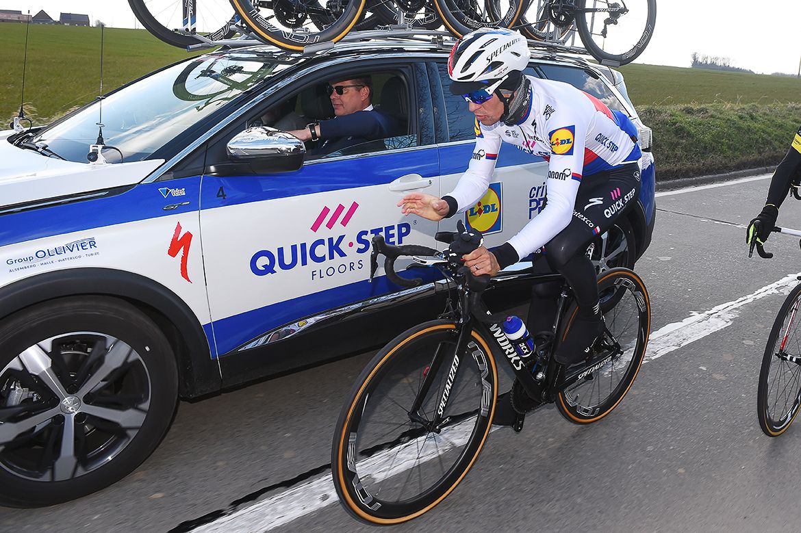 Zdenek Stybar talks with director Wilfried Peeters at the Quick-Step team car