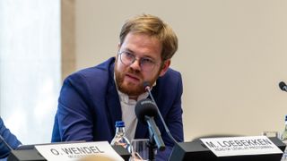 Marc Loebekken, Head of Legal at ProtonMail, on stage at the War, Peace and Neutrality Forum 2025 held at the United Nations in Geneva on October 10, 2025