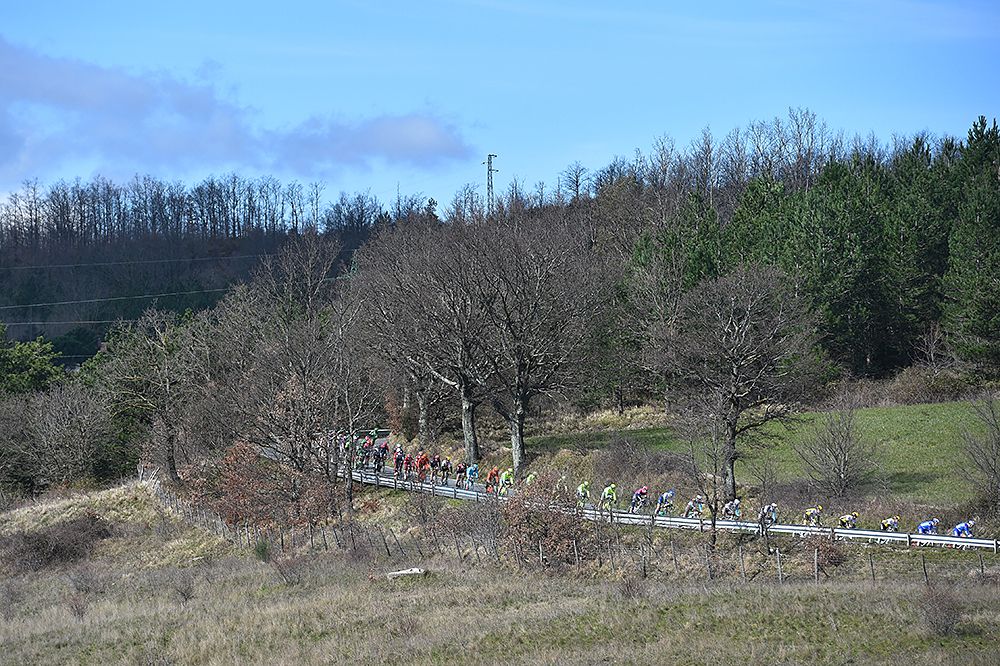 The peloton riding through the Italian countryside