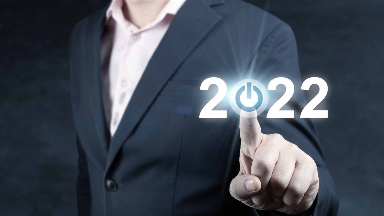 man pointing to 2022