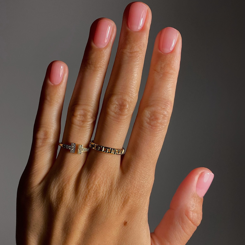 A manicure painted with Manucurist Active Glow Blueberry