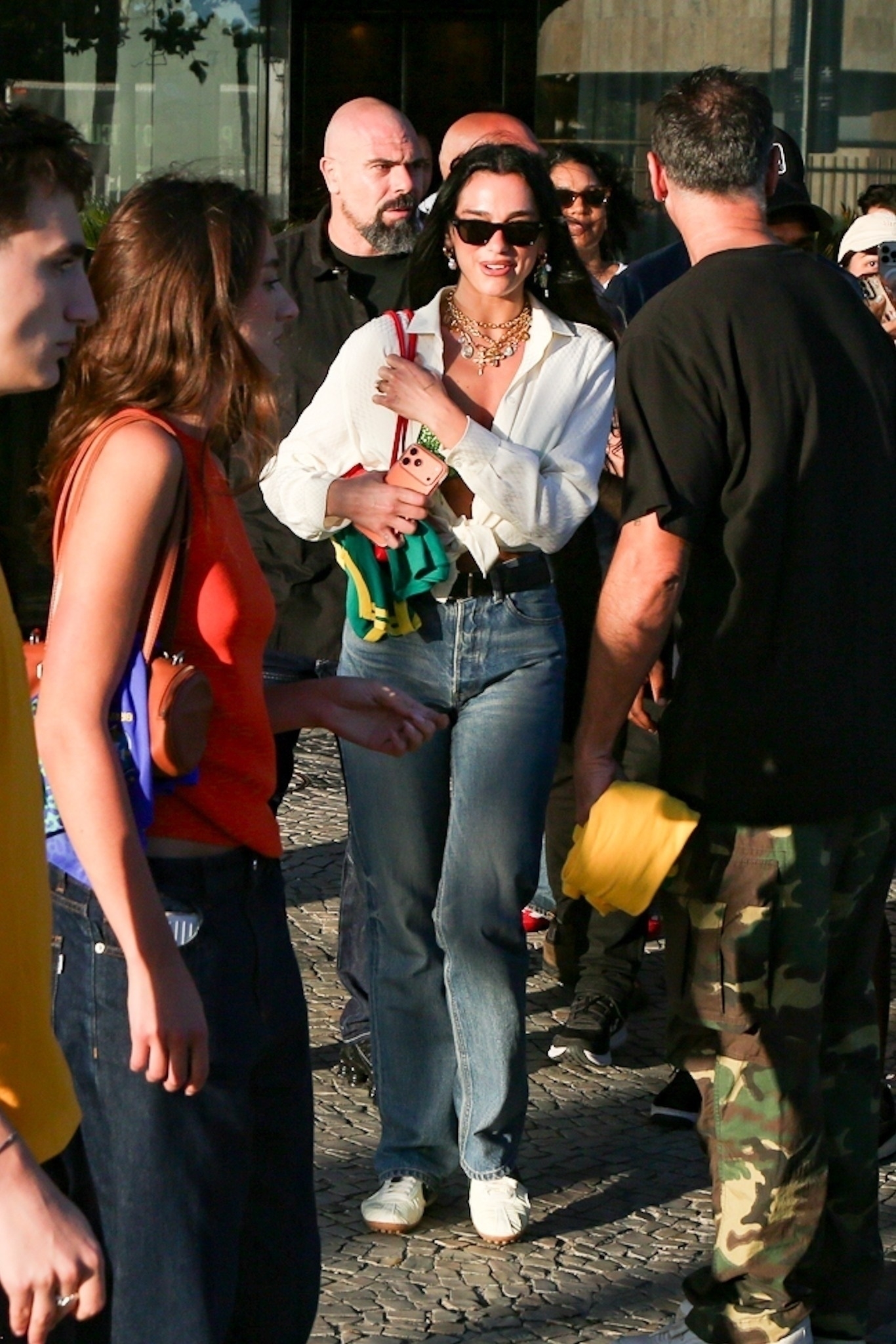 Dua Lipa in jeans and sneakers