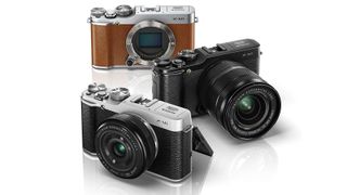 Three Fujifilm X-M1 cameras (brown, silver, black) against a white background