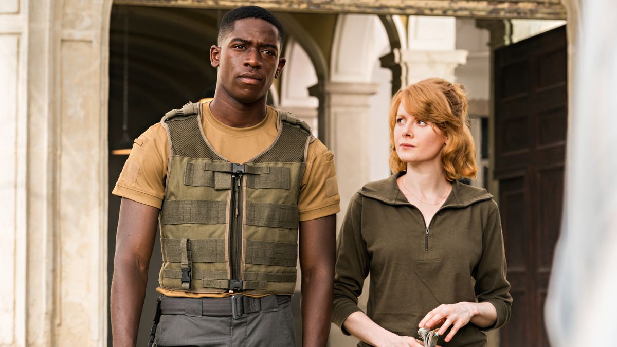 Damson Idris as Harp and Emily Beecham as Sofiya in "Outside the Wire" on Netflix.