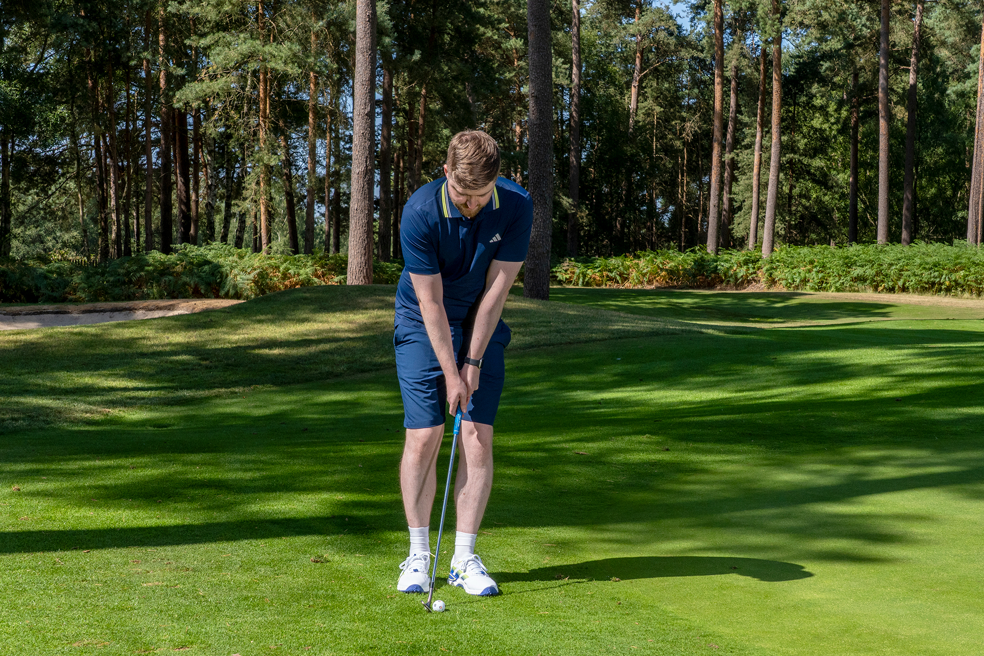 James Henry adjusting his ball position, as suggested by Dan Grieve, to ensure his sternum is target side of the ball - leading to more consistent strikes
