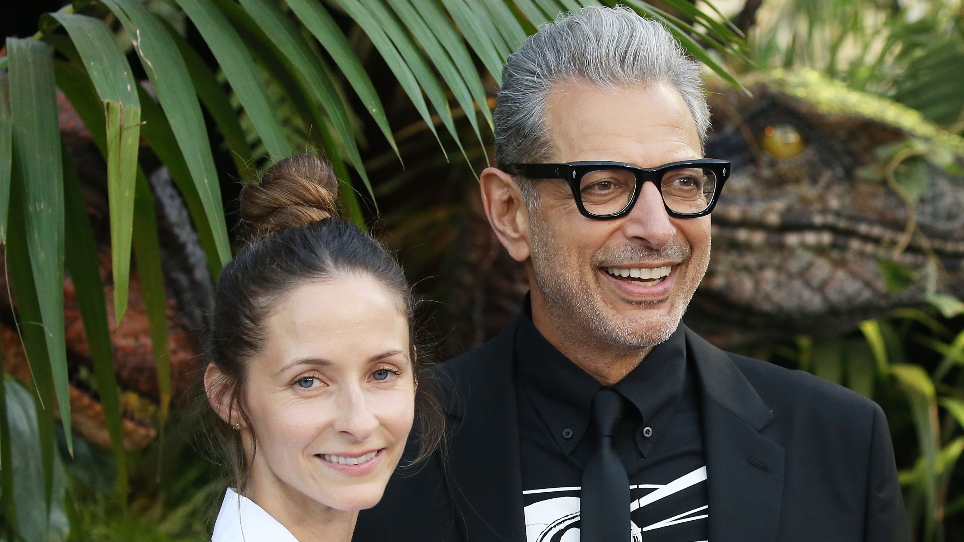 emilie and jeff goldblum on a green background