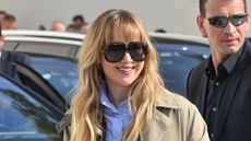 Jennifer Lawrence wearing trench coat at Paris Fashion Week on 1 October, 2025