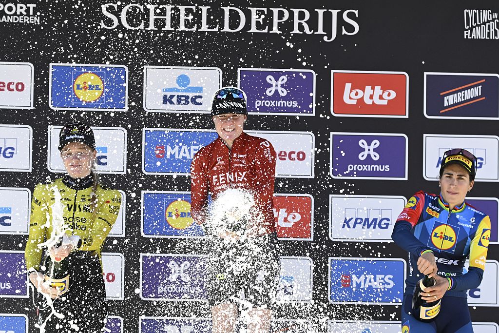 Dutch Nienke Veenhoven of Team Visma-Lease a Bike, Dutch Charlotte Kool of Fenix-Premier Tech and Italian Elisa Balsamo of Lidl-Trek celebrate on the podium of the women's race of the 'Scheldeprijs' one day cycling event, 130,3km from and to Schoten on Wednesday 08 April 2026.BELGA PHOTO TOM GOYVAERTS (Photo by Tom Goyvaerts / BELGA MAG / Belga / AFP via Getty Images)