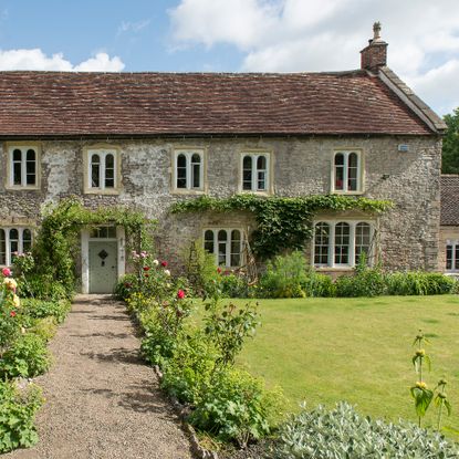 exterior of a stone listed house in somerset