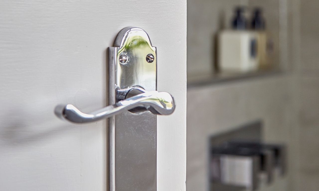 White door with chrome handle