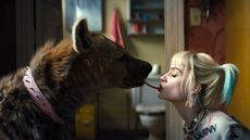 Bruce the hyena shares a tender moment with a friend.