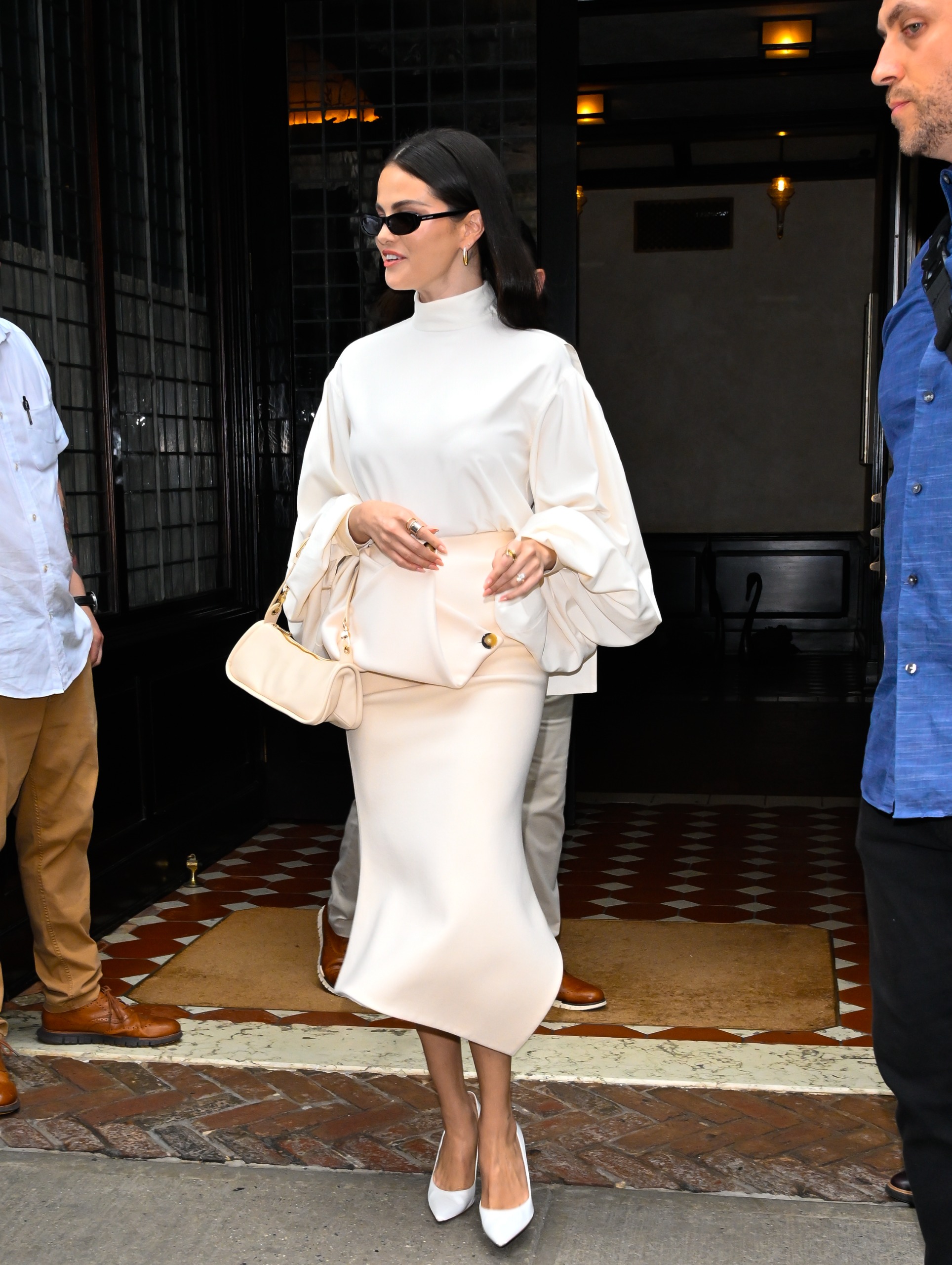 Selena Gomez styled her "no white after Labor Day" look with a matching Longchamp east-west bag