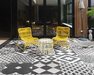 monochrome patio tile ideas with yellow modern furniture