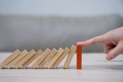 Domino,Wooden block,Business risk, strategy and planning concept idea