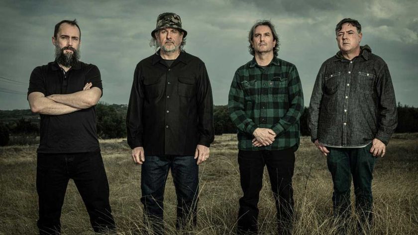 Clutch standing in a field with gloomy skies in the background