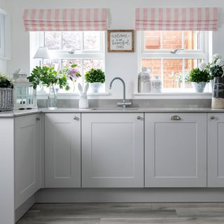 white kitchen with drawers and worktop