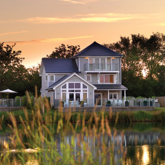 house exterior with lake view