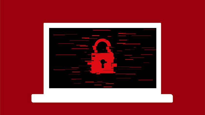 Ransomware concept image showing digitized padlock pictured on a laptop screen on red background