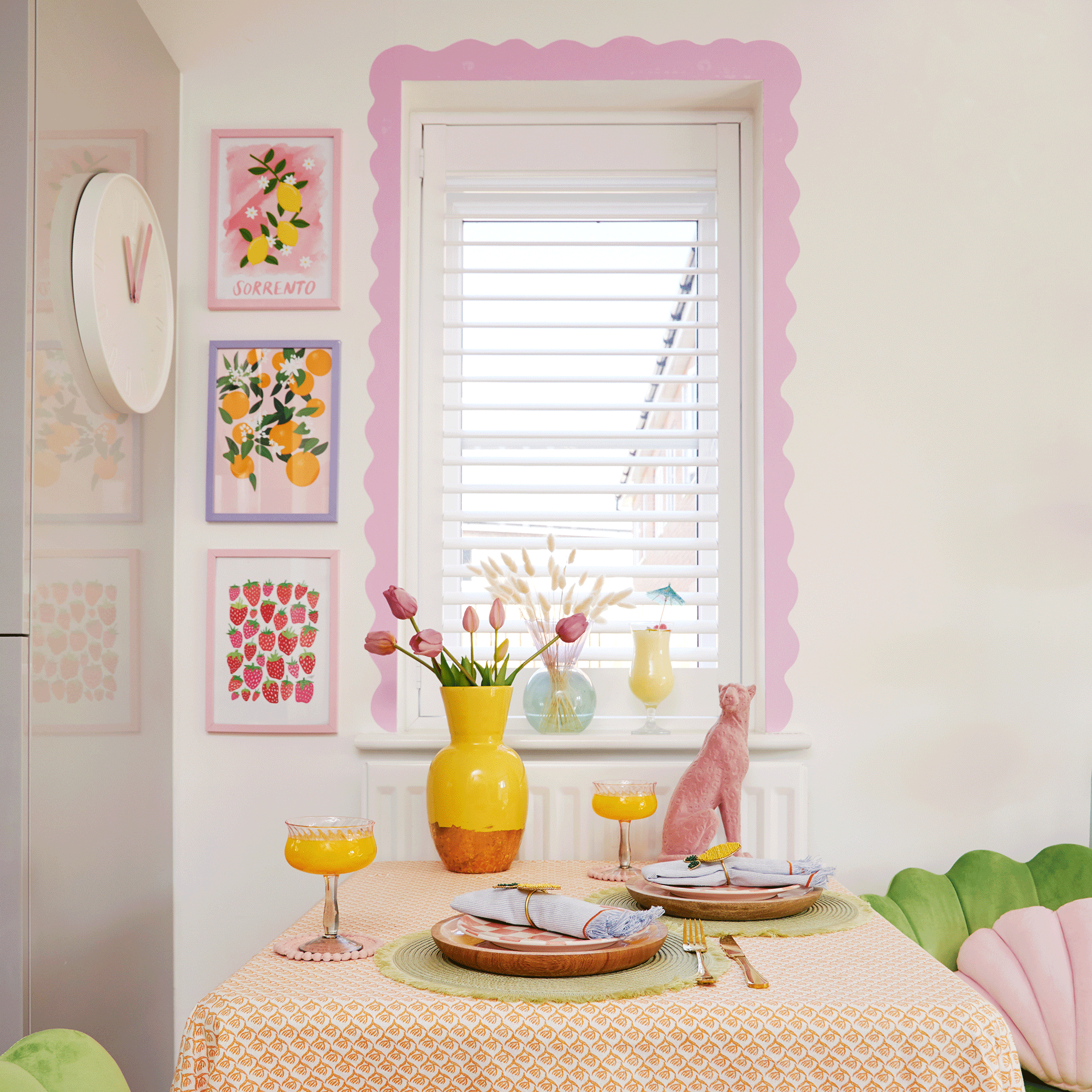 Window with pink squiggle border and table