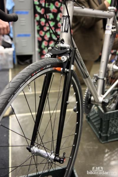 Soulcraft builder Sean Walling opted for a segmented steel fork on this stainless steel all-road creation at NAHBS.