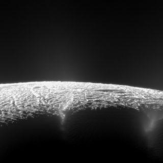 This view from NASA's Cassini spacecraft looks across the geyser basin near the south pole of Saturn's moon Enceladus. Plumes of water vapor and ice might erupting from cracks in Enceladus' surface could offer clues about the moon's subsurface ocean, thought to be a good candidate in the search for extraterrestrial life.