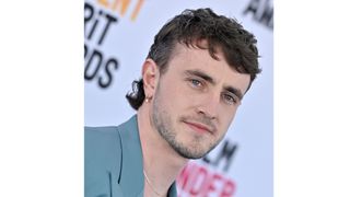 A side shot of Paul Mescal and his mullet, as he wears a blue suit and attends the 2023 Film Independent Spirit Awards on March 04, 2023 in Santa Monica, California