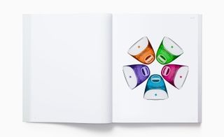View of two pages inside the 'Designed by Apple in California' book - one page is blank and the other features a photo of five iMac replicas from 1998 in different colours