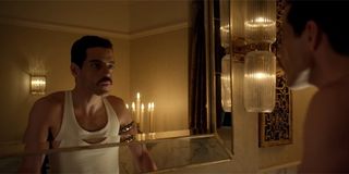 Rami Malek looking in the mirror in Bohemian Rhapsody